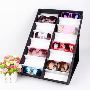 Sunglasses folding holder display with 16 slots, black with a white lining