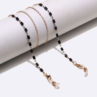 Gold-colored metal non-slip chain, with restangular black crystal, for glasses and masks GL1477