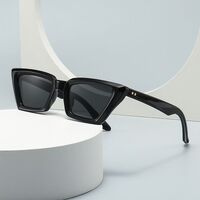 Plastic sunglasses in the shape of a 