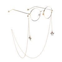 Gold-colored metal non-slip chain, with pendant angel and rhinestone, for glasses and masks GL811