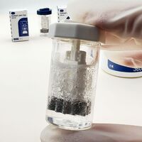 Handheld portable contact lens cleaner and sterilizer for cleaning with hydrogen peroxide solution H-667