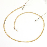 Металлическая цепочка золотистого цвета с дисками для очков GL1112