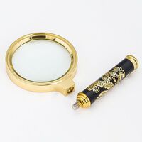 Magnifier, magnifying glass with a handle with a dragon pattern 金-龙90-XX, diameter: 75 mm, magnification: 5X