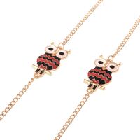 Gold-colored metal non-slip chain, with owl, for glasses and masks GL039