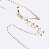 Gold-colored metal non-slip chain, with round and transparent rhinestone, for glasses and masks GL1606