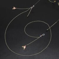Gold-colored metal non-slip chain, with carriage pendant, for glasses and masks GL728