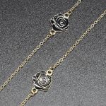 Gold-colored metal non-slip chain, with black rose, for glasses and masks GL394
