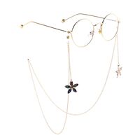 Gold-colored metal non-slip chain, with pendant flower, for glasses and masks GL816