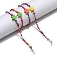 Metal glasses chain with color small daisy disc pendants GL1366