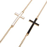 Gold-colored metal non-slip chain, with black and white cross, for glasses and masks GL040
