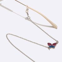 Gold-colored metal non-slip chain, with butterfly, for glasses and masks GL1580