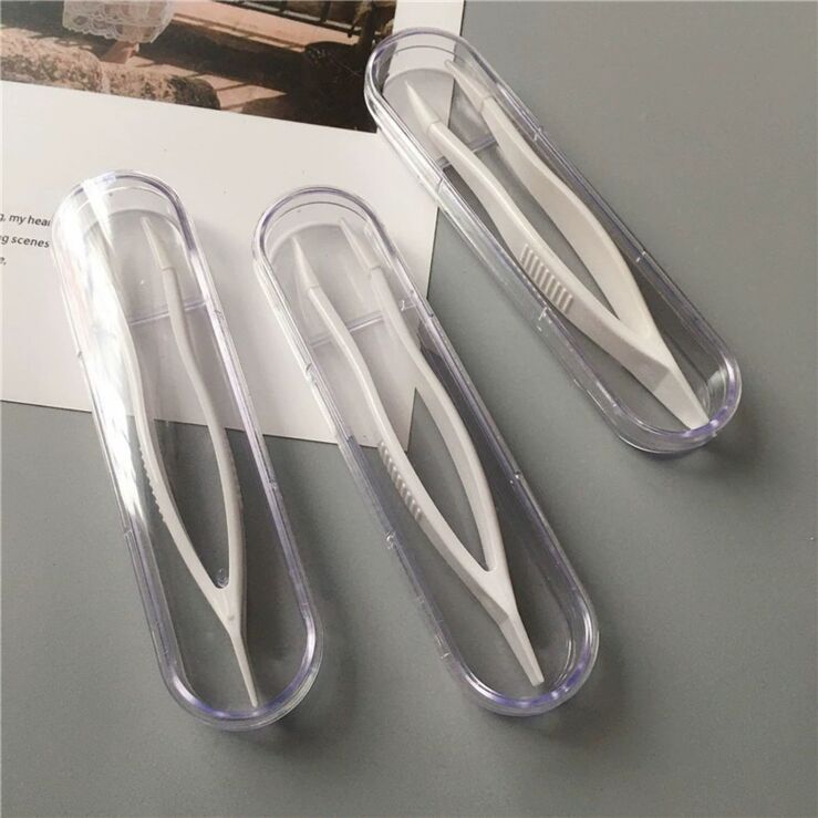 Tweezers with silicone tips for working with contact lenses in individual packaging