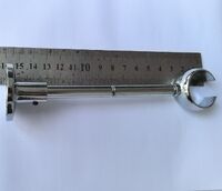 Glasses holder, spare part for stands, displays and showcases for glasses