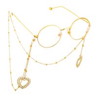 Gold-colored metal non-slip chain, with pendant heart and beads, for glasses and masks GL536