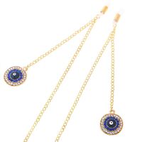 Gold-colored metal non-slip chain, with pendant round with rhinestone, for glasses and masks GL251