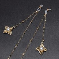 Gold-colored metal non-slip chain, with pendant leaf and pearl, for glasses and masks GL548