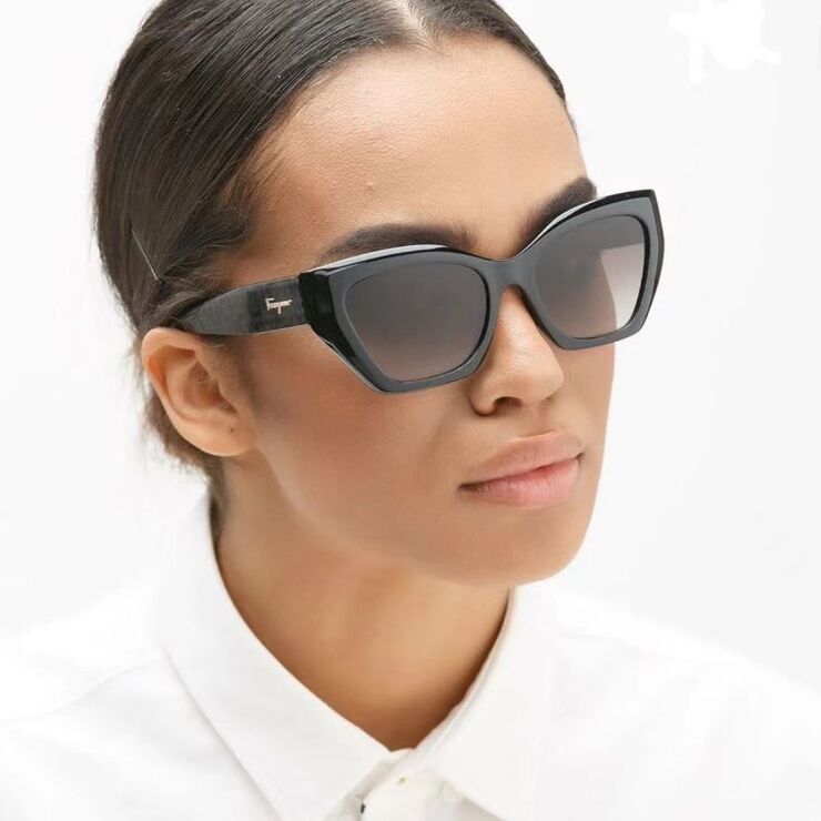 Plastic sunglasses in the shape of a 