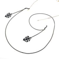 Black-colored metal non-slip chain, with pendant hollow leaves, for glasses and masks GL782