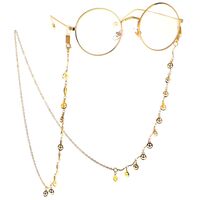 Gold-colored metal non-slip chain, with smiley face, for glasses and masks GL103