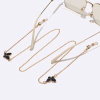 Металлическая нескользящая цепочка золотого цвета, с черной бабочкой, для очков и масок GL1561