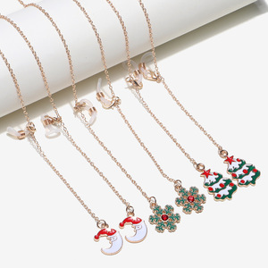 Set of three glasses chain with St. Clauses, snowflakes and christmas trees GM082