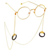 Gold-colored metal non-slip chain, with wood black round pendant, for glasses and masks GL308