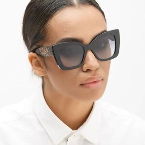 Plastic sunglasses in the shape of a cat's eye Elit 2407-EL