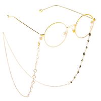 Gold-colored metal non-slip chain, with black and white glass beads, for glasses and masks GL336