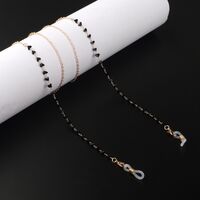 Gold-colored metal non-slip chain, with black triangle crystal, for glasses and masks GL976