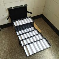 Mobile box (suitcase, trunk, organizer, display case) on wheels for frames and glasses for 56 slots JS-C190518