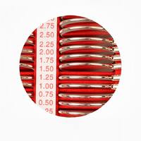 232 metal rim ophthalmic trial lens set in an aluminum case