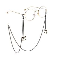 Black-colored metal non-slip chain, with pendant bow, for glasses and masks GL773