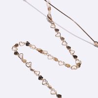 Gold-colored metal non-slip chain, with gold heart, for glasses and masks GL1415