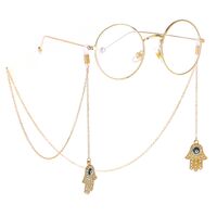 Gold-colored metal non-slip chain, with pendant palm and rhinestone, for glasses and masks GL245