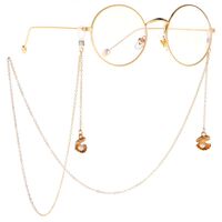 Gold-colored metal non-slip chain, with shell and pearl, for glasses and masks GL017