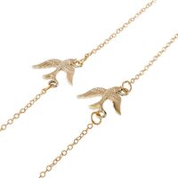Gold-colored metal non-slip chain, with a swallow, for glasses and masks GL025