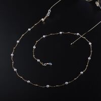 Gold-colored metal non-slip chain, with pearl bead, for glasses and masks GL946