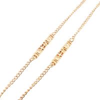 Gold-colored metal non-slip chain, with the text 