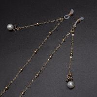Gold-colored metal non-slip chain, with pendant pearl and beads, for glasses and masks GL580