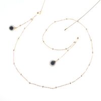 Gold-colored metal non-slip chain, with beads and black balls, for glasses and masks GL787