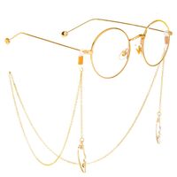 Gold-colored metal non-slip chain, with pendant mask face, for glasses and masks GL303