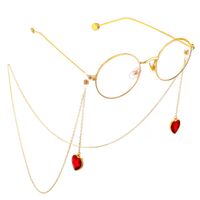 Gold-colored metal non-slip chain, with pendant crystal heart, for glasses and masks GL568