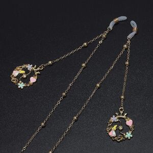Gold-colored metal non-slip chain, with pendant flower girl and beads, for glasses and masks GL577