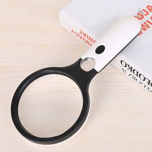 Magnifier with universal backlight, magnifying glass with handle 70108-XX, diameter 108 mm, magnification: 4Х, 30Х
