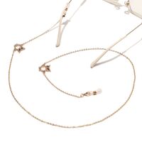 Gold-colored metal non-slip chain, with owl with rhinestone, for glasses and masks GL1446