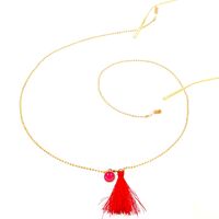 Gold-colored metal non-slip chain, with red tassel and smiley, for glasses and masks GL159