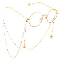 Gold-colored metal non-slip chain, with pendant crystal and beads, for glasses and masks GL550