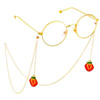 Gold-colored metal non-slip chain, with pendant strawberry, for glasses and masks GL565