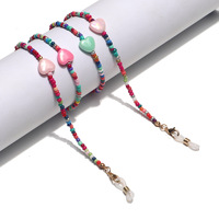 Металлическая цепочка для очков с цветными маленькими подвесками в виде ромашек GL1366